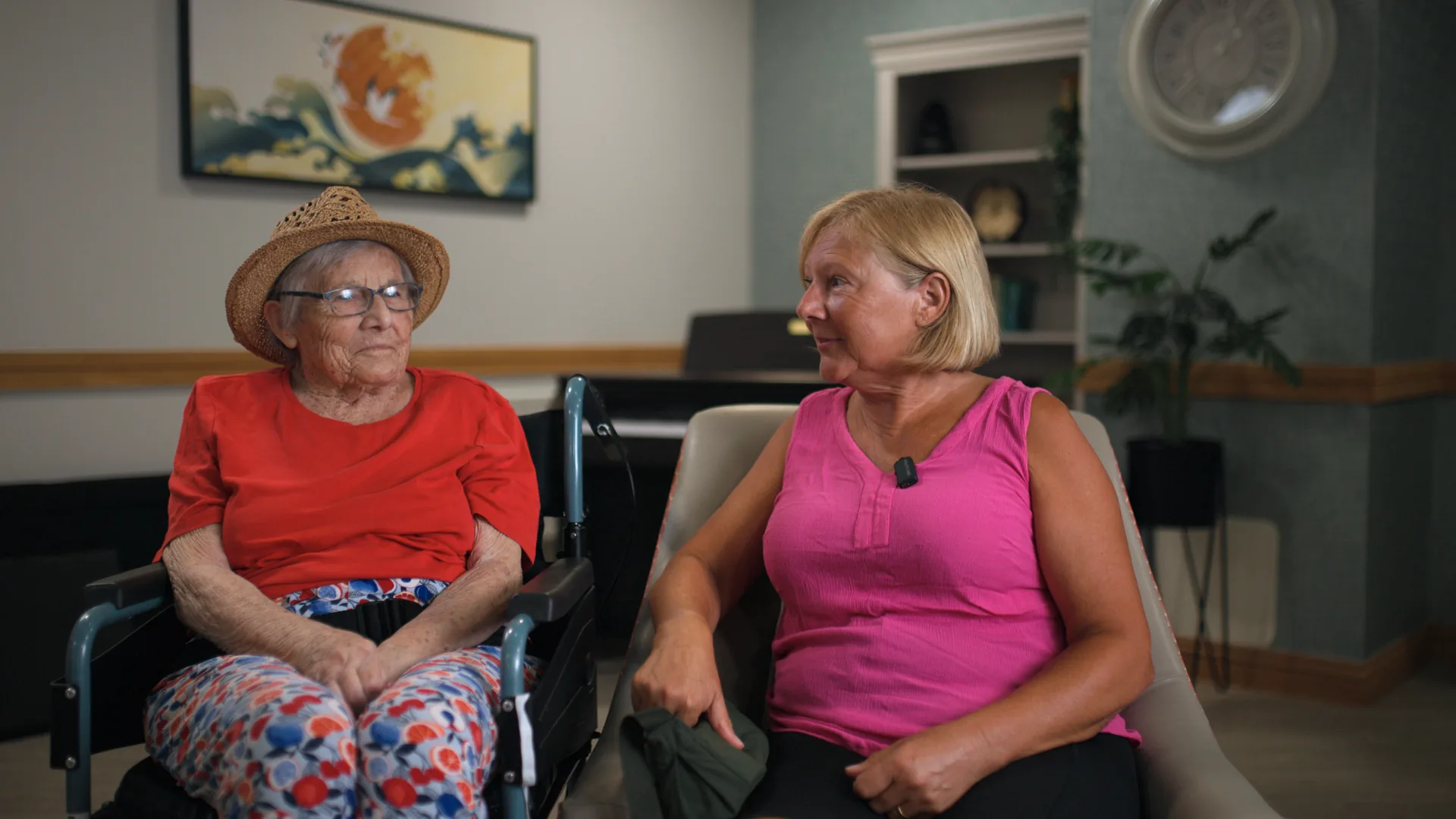 A resident talking things through with her daughter in the lounge.